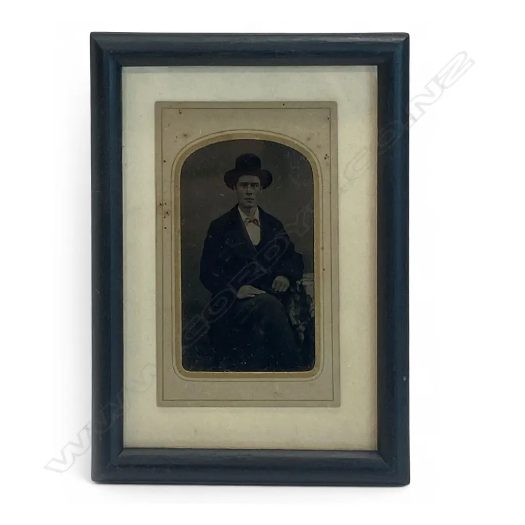 Card-mounted tintype - seated man in hat, Image 1++